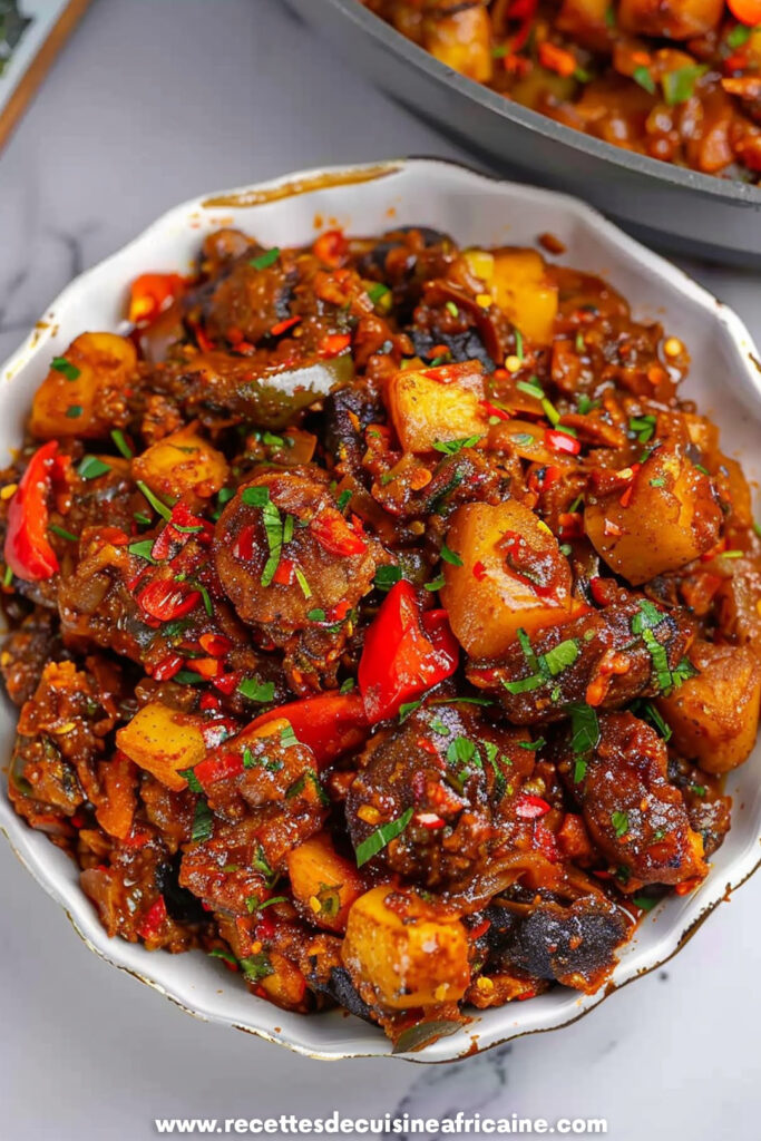 Gizdodo (Gésier épicé et Plantains)